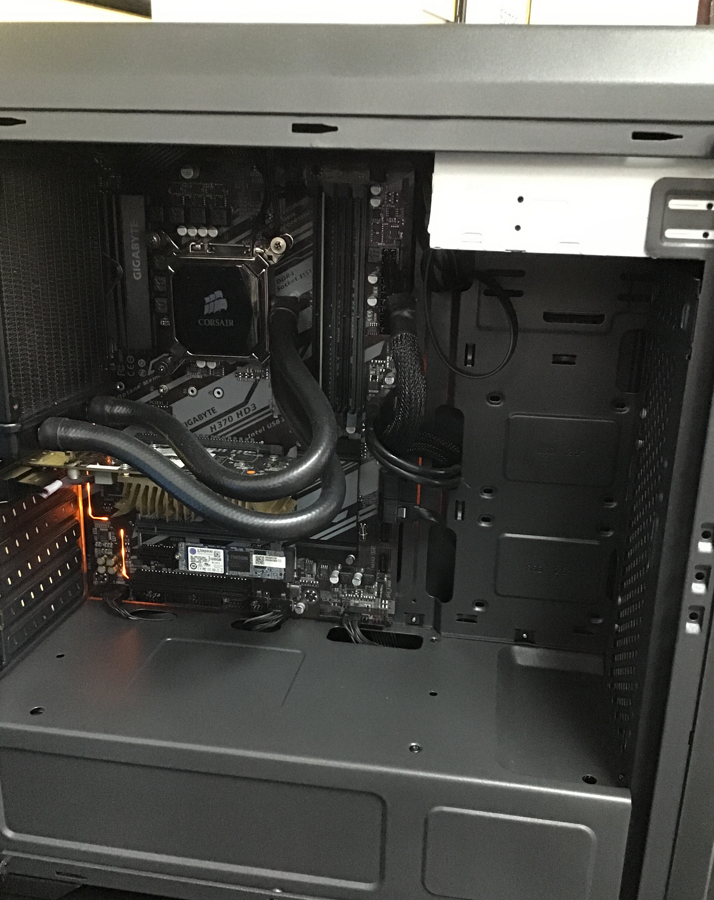 Inside a PC with water cooling that has just been serviced.