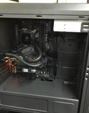 Inside a PC with water cooling that has just been serviced.